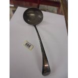 A silverplate soup ladle.