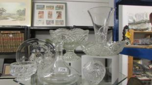 A mixed lot of glass bowls, vase, decanter etc.,