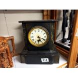 A 19th century black slate Paladian style clock in working order. COLLECT ONLY.