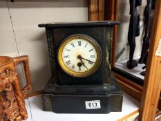 A 19th century black slate Paladian style clock in working order. COLLECT ONLY.