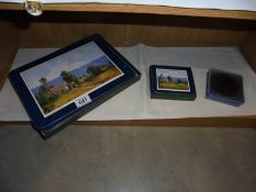 A set of place mats and two sets of coasters.