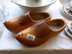 A pair of vintage wooden clogs