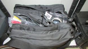 A camera and accessories with bag.