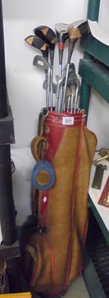 A vintage golf bag with clubs, COLLECT ONLY.