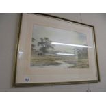 A framed and glazed rural scene.