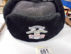 A Russian style hat with Harley Davidson badge.