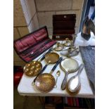 A cased carving set, brass pans, chamber candlesticks & EPNS brush & mirror set etc.