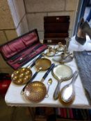 A cased carving set, brass pans, chamber candlesticks & EPNS brush & mirror set etc.