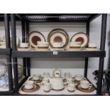 Two shelves of Denby pottery. COLLECT ONLY.