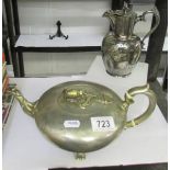 A decorative silver plate tea pot and a hot water jug.