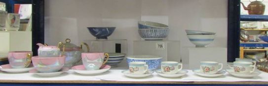 A mixed lot of porcelain teaware, bowls etc.,