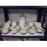A Denby pottery coffee pot, mugs etc.,