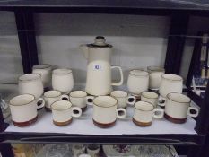 A Denby pottery coffee pot, mugs etc.,