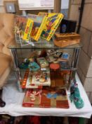 A good lot of vintage games, cribbage boards, Merit blow football etc., completeness unknown.