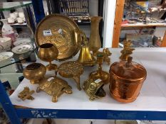 A mixed lot of brass ware including bell, candlesticks etc.,