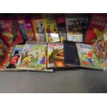A mixed lot of children's books including Rupert, Eagle etc.,