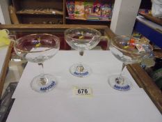 Three Babycham glasses.