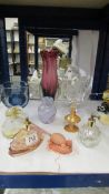 A mixed lot of coloured glass ware including perfume bottles.