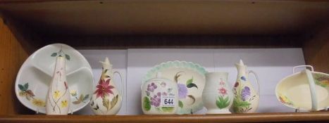 A mixed lot of hand painted ceramics.
