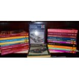 Twenty various Haynes service manuals.