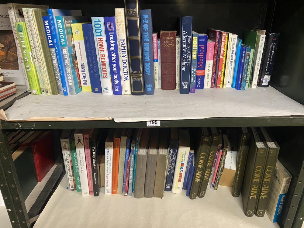 2 shelves of books on Health, Medicine, Well Being, Yoga etc
