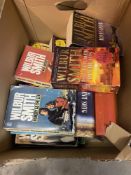A box of modern fuction mainly Wilbur Smith