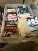 A crate of paperback fiction mixed genres