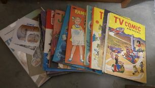 A quantity of comic annuals and TV related books including The Prisoner, TV Comic Annual etc