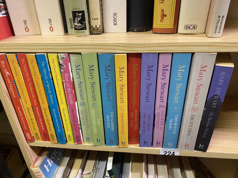 A collection of Mary Stewart and McCall Smith paperbacks