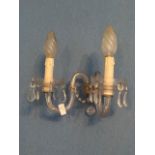 Set of three matching two branch cut glass wall ensconces