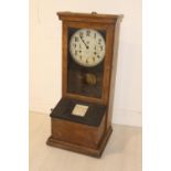 Early 20th C. oak clock in clock out clock.