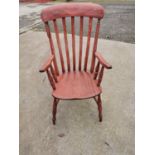Pine slat back arm chair {106 cm H x 56 cm W x 48 cm D}.
