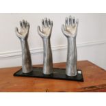 Set of early 20th C. polished metal glove makers hands.