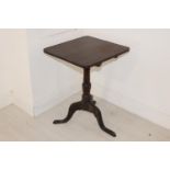 19th C. mahogany tilt top lamp table.