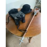 Shooting stick, pair of binoculars and bowler hat