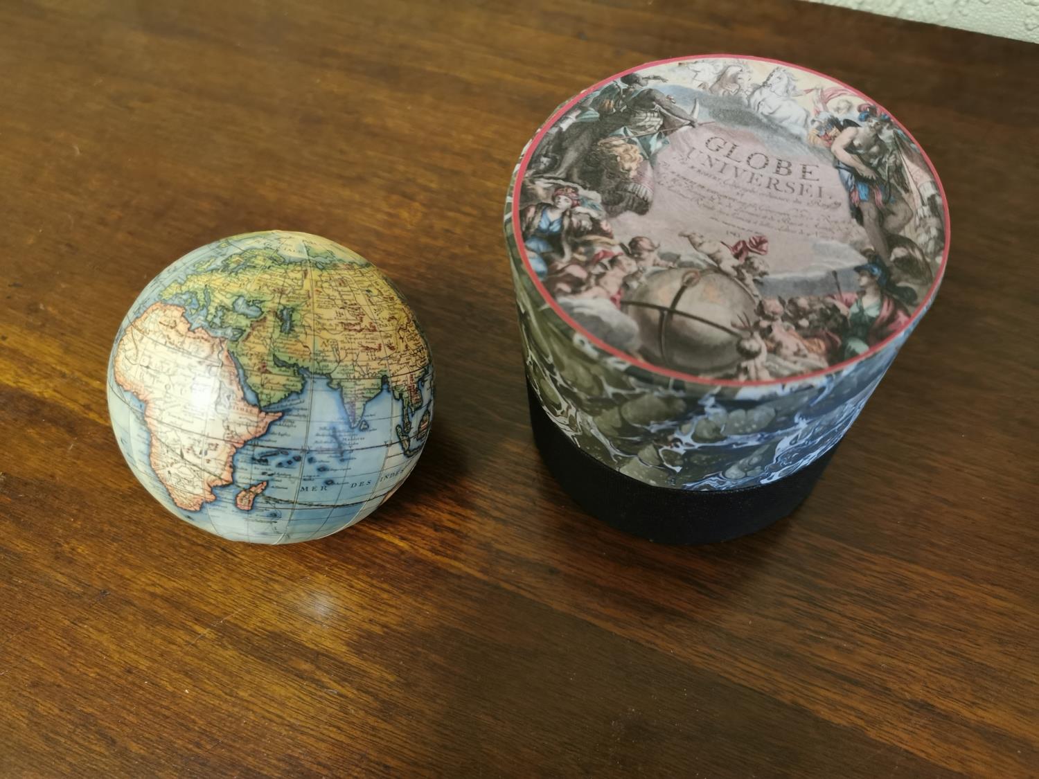 Miniature world globe with original box.