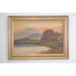 Oil on canvas lake and mountain scene.