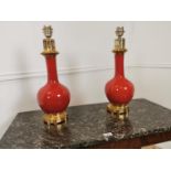 Pair of Oriental ceramic and brass lamps.