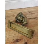 Brass door knocker and letter box.