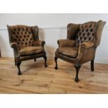 Pair of early 20th C. hand died brown leather chairs.