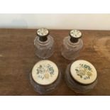 Two moulded glass perfume bottles