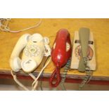 Three vintage telephones