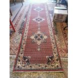 Persian hand knotted wool runner.