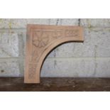 Arched mahogany corbel