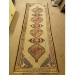 Persian hand knotted wool runner.