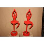 Pair of red painted Ballerina statues