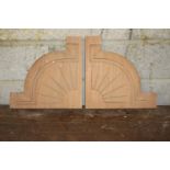 Pair of mahogany corbels decorated with sunbursts