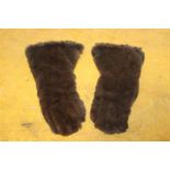 Pair of leather and fur gloves.