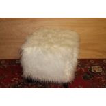 White faux fur upholstered stool