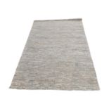 Grey rope design rug.